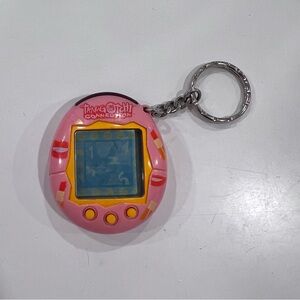 Vintage 2004 Tomagotchi Connection V2 pink w/ lipstick and lips